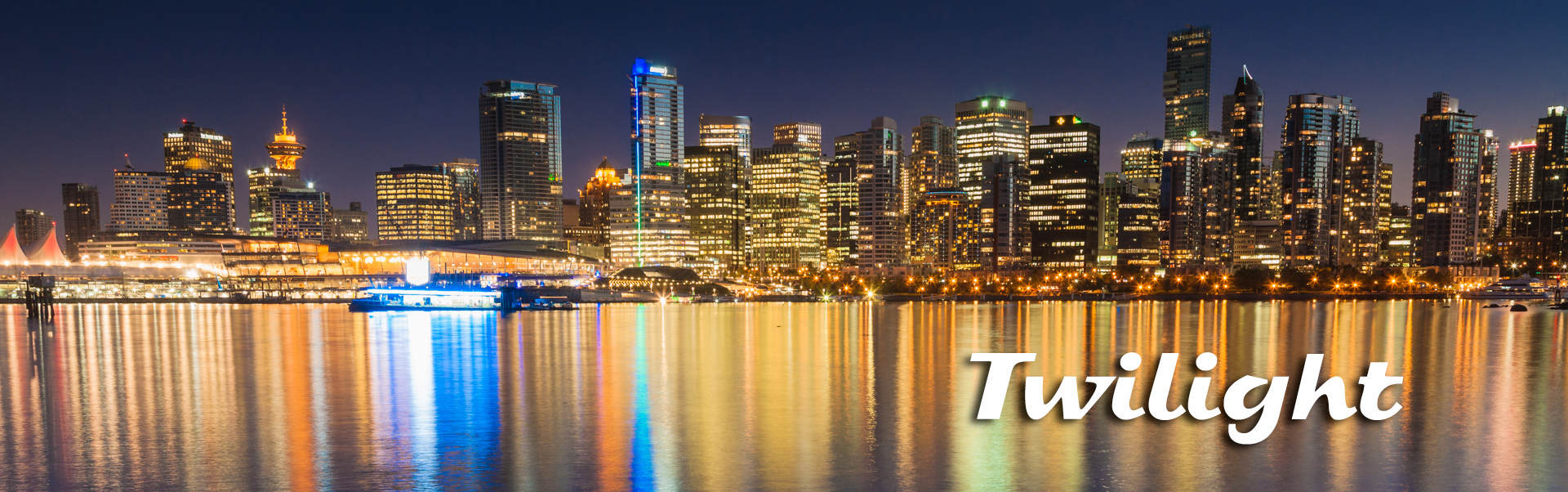 Vancouver Skyline by night with illuminated skyscrapers, British Columbia, Canada